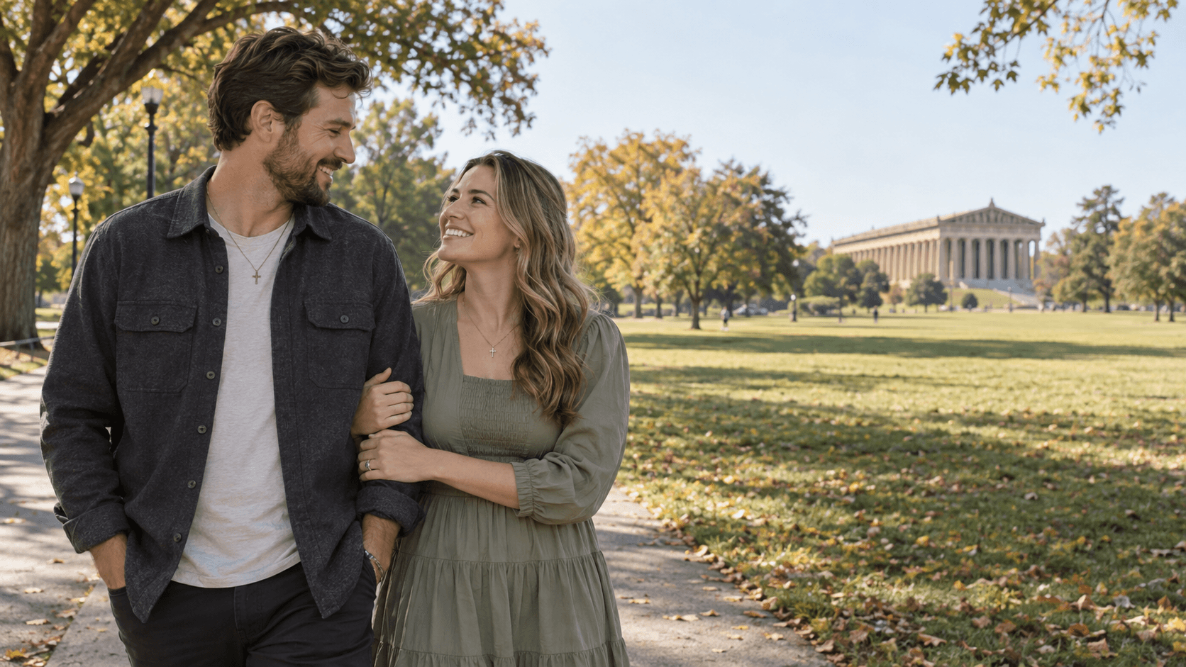 Christian couple in Centennial Park with Nashville’s Parthenon in the distance.